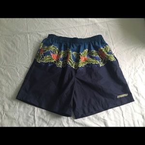 Blue Men’s Nautica swimming trunks, size L.
